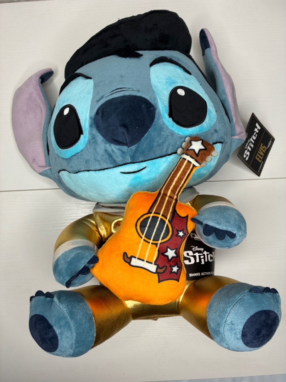 PELVIS Blue Plush in Gold Outfit with Orange Guitar